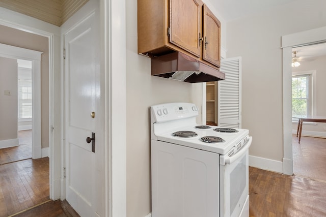 kitchen with white range with electric stovetop, ceiling fan, and dark hardwood / wood-style flooring