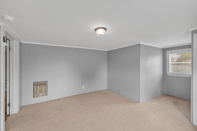 bonus room with light carpet and heating unit