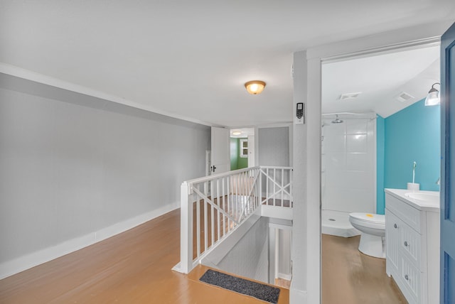 hallway featuring hardwood / wood-style floors