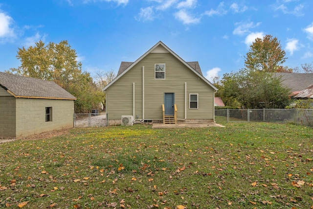 back of property featuring a patio, ac unit, and a lawn