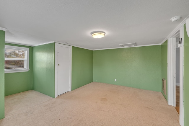 interior space featuring ornamental molding and light carpet