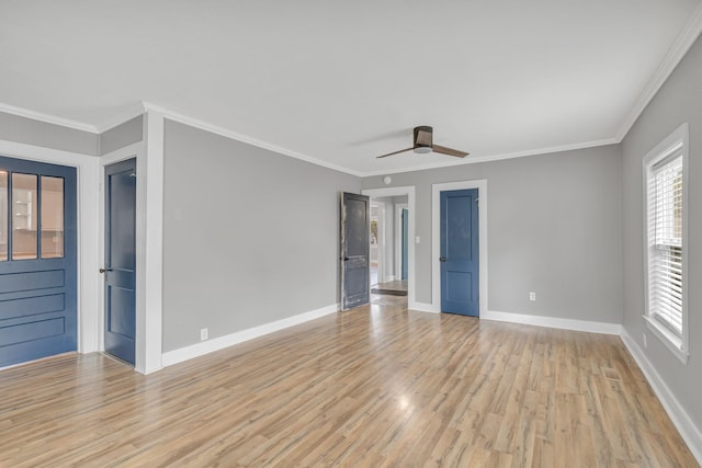 spare room with ornamental molding, light hardwood / wood-style flooring, and ceiling fan