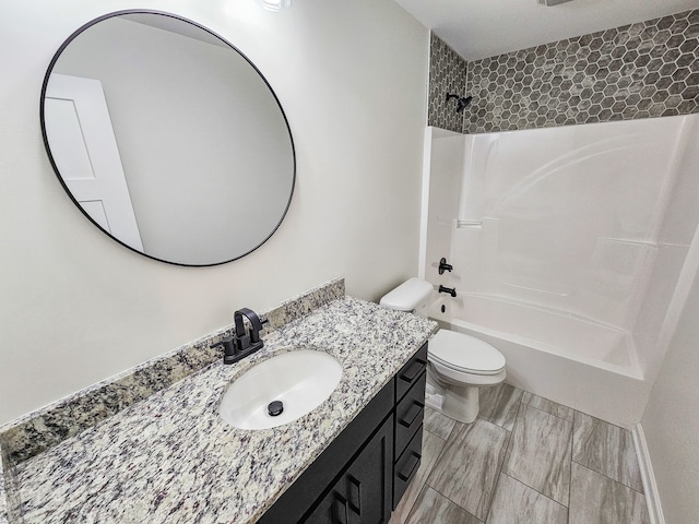 full bathroom with vanity, toilet, and shower / bathtub combination