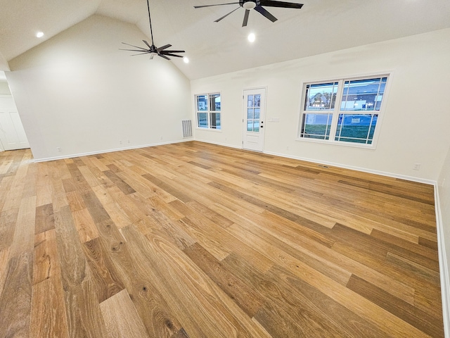 unfurnished living room with light hardwood / wood-style flooring, lofted ceiling, and ceiling fan