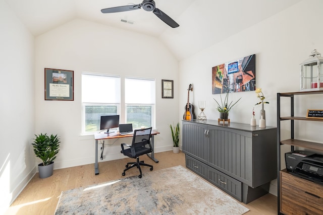 office with ceiling fan, vaulted ceiling, and light wood-type flooring