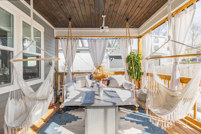 sunroom with wooden ceiling