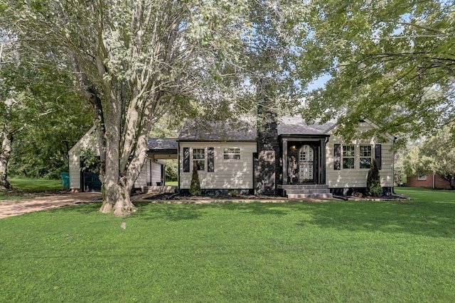 view of front of home with a front lawn