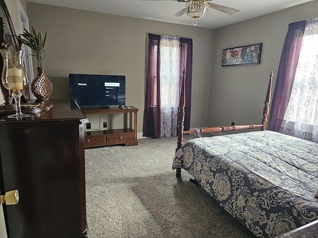 bedroom featuring carpet and ceiling fan