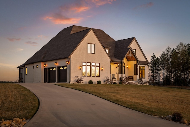 view of front of property with a lawn