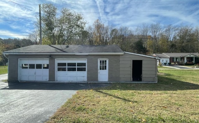 garage with a yard