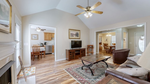 living room featuring ceiling fan, light wood-type flooring, and lofted ceiling