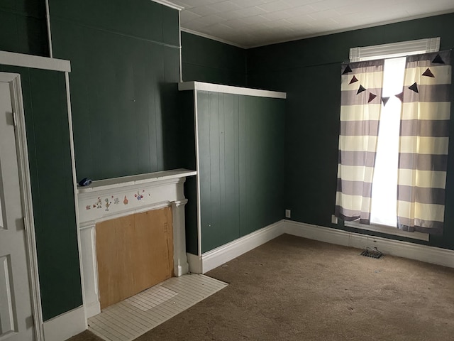 empty room with carpet flooring