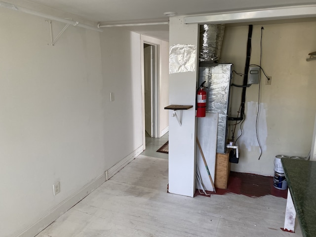 basement featuring light hardwood / wood-style floors