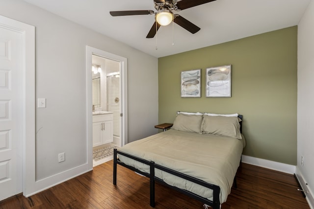 bedroom featuring ceiling fan, dark hardwood / wood-style flooring, and ensuite bath