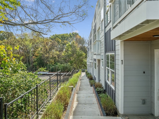 view of property exterior with a balcony