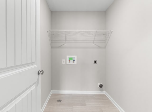 laundry room featuring hookup for a washing machine and electric dryer hookup