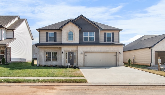 view of front facade featuring a front lawn and a garage