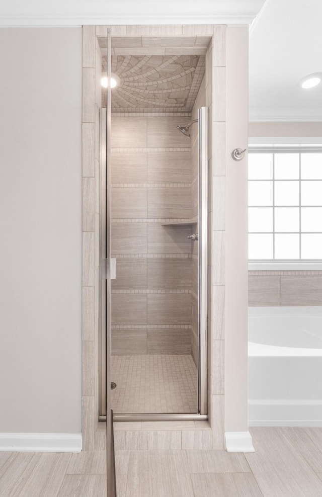 646 Woodrush Dr, Clarksville, TN 37040 - full bathroom featuring a stall shower, crown molding, and a garden tub