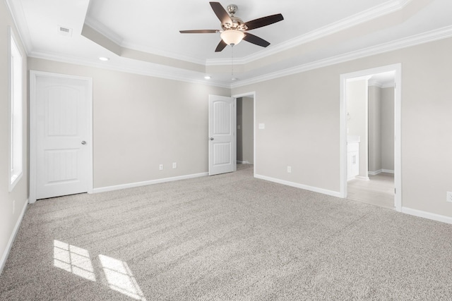 646 Woodrush Dr, Clarksville, TN 37040 - unfurnished bedroom featuring a raised ceiling, crown molding, carpet, baseboards, and ensuite bathroom