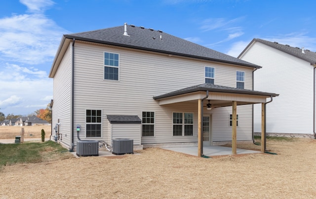 rear view of house featuring central air condition unit, a patio area, and ceiling fan