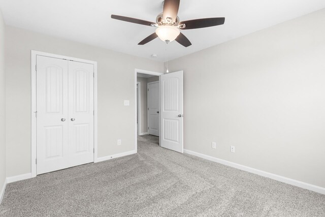 646 Woodrush Dr, Clarksville, TN 37040 - unfurnished bedroom with carpet, a closet, baseboards, and ceiling fan