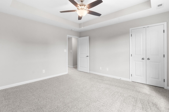 646 Woodrush Dr, Clarksville, TN 37040 - unfurnished bedroom with a raised ceiling, baseboards, and a closet