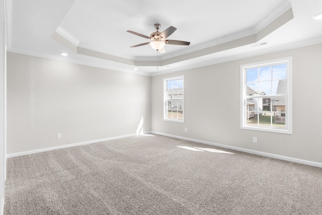 646 Woodrush Dr, Clarksville, TN 37040 - carpeted spare room with a raised ceiling, ornamental molding, a ceiling fan, baseboards, and recessed lighting