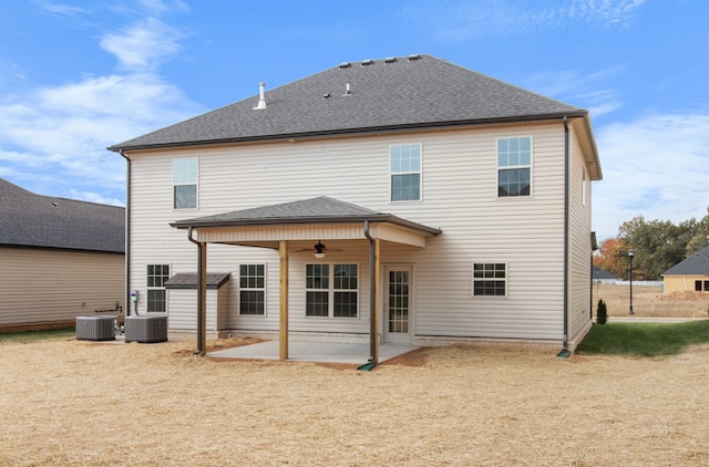 back of property with cooling unit, a patio, and ceiling fan