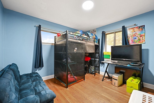 bedroom featuring hardwood / wood-style flooring