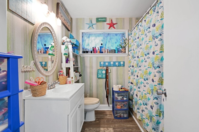 bathroom with vanity, a shower with curtain, wood-type flooring, and toilet