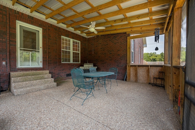 view of patio featuring ceiling fan