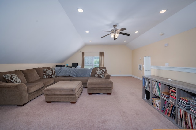 living room featuring lofted ceiling, light colored carpet, and ceiling fan