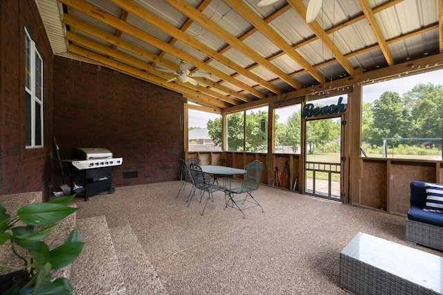 sunroom / solarium with vaulted ceiling and ceiling fan