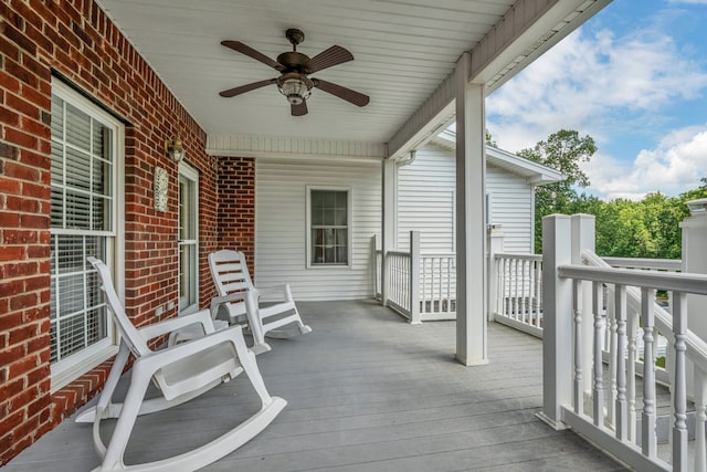 wooden terrace with ceiling fan