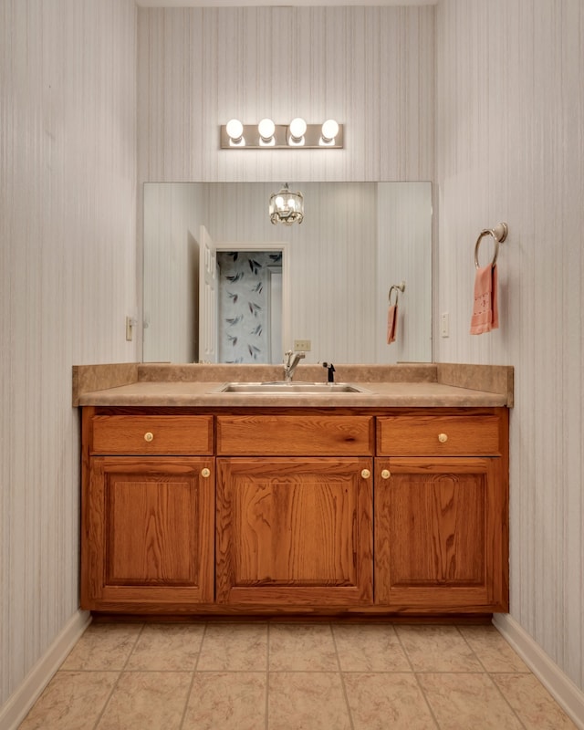 bathroom with vanity and tile patterned flooring