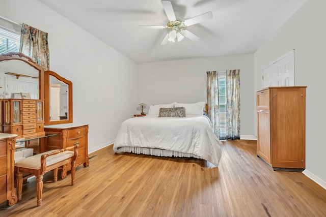 bedroom featuring light wood-type flooring and ceiling fan