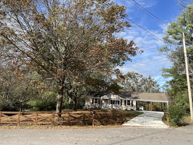 view of front of home with a carport