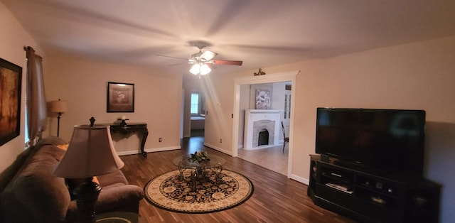 104 Oak Crest Dr, Tennessee Ridge, TN 37178 - living area featuring a ceiling fan, wood finished floors, a fireplace, and baseboards