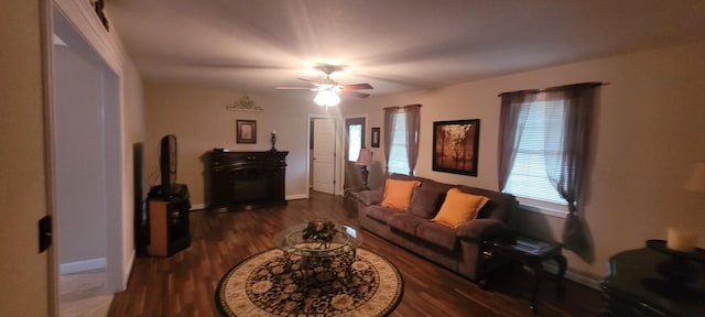 104 Oak Crest Dr, Tennessee Ridge, TN 37178 - living area featuring healthy amount of natural light, wood finished floors, a fireplace, and baseboards