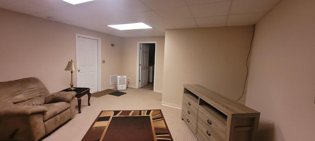 104 Oak Crest Dr, Tennessee Ridge, TN 37178 - carpeted living area with a paneled ceiling and baseboards