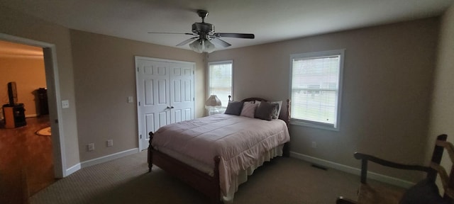 104 Oak Crest Dr, Tennessee Ridge, TN 37178 - bedroom featuring carpet floors, baseboards, a closet, and ceiling fan