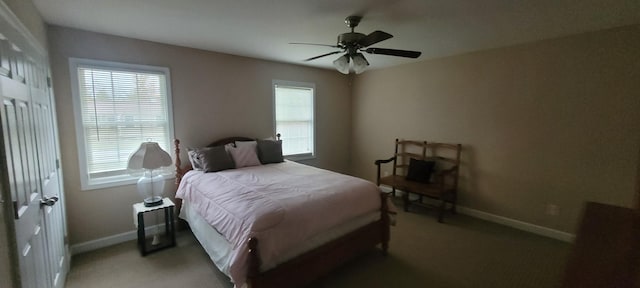 104 Oak Crest Dr, Tennessee Ridge, TN 37178 - bedroom with light colored carpet, baseboards, and ceiling fan