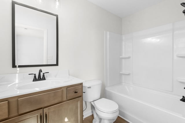 full bathroom featuring vanity, toilet, and shower / washtub combination