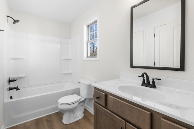 full bathroom with wood-type flooring, vanity, toilet, and shower / bathtub combination