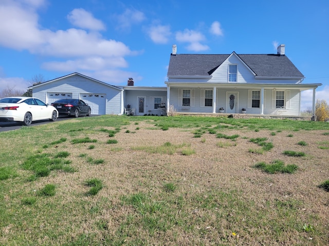 view of front of house with a porch and a garage