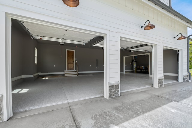 garage with strapped water heater