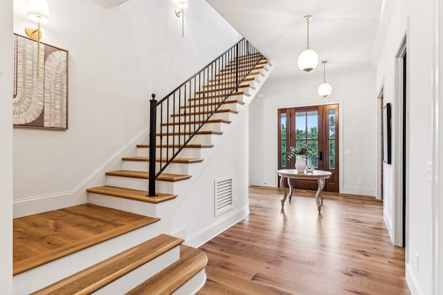 entrance foyer featuring hardwood / wood-style floors