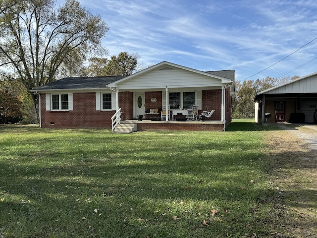 view of front of property with covered porch and a front yard