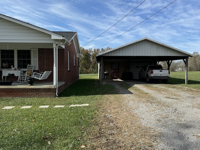 view of property exterior featuring a yard and covered porch