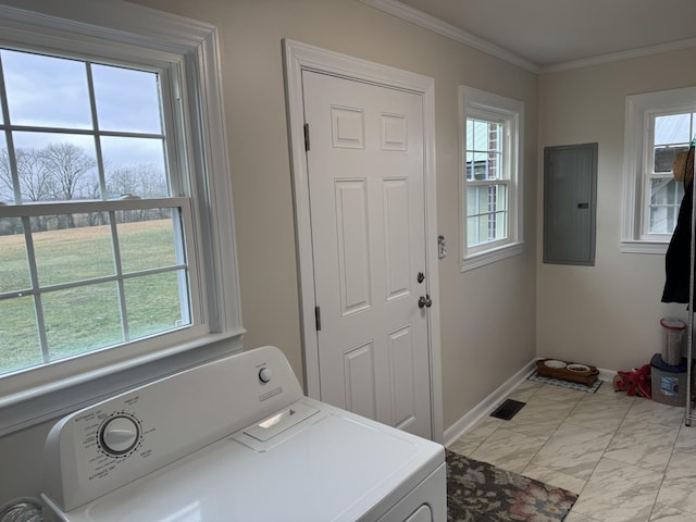 washroom featuring crown molding, washer / dryer, and electric panel